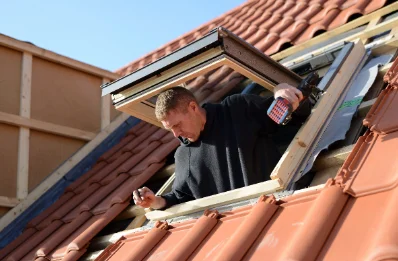 Pose de fenêtres de toit Velux à Loye